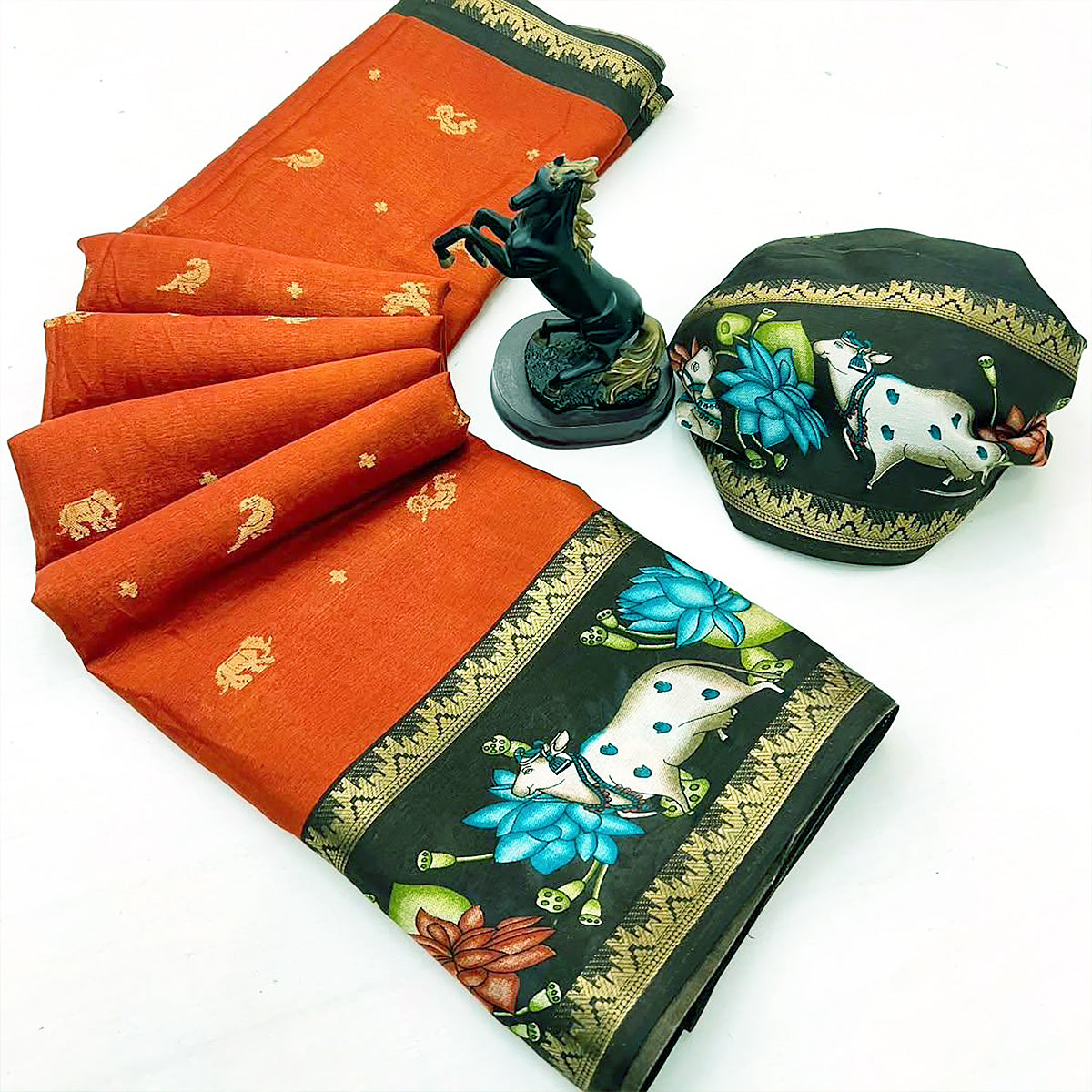 Rust Orange Muslin Silk Saree with Pichwai Cow & Lotus Print Border